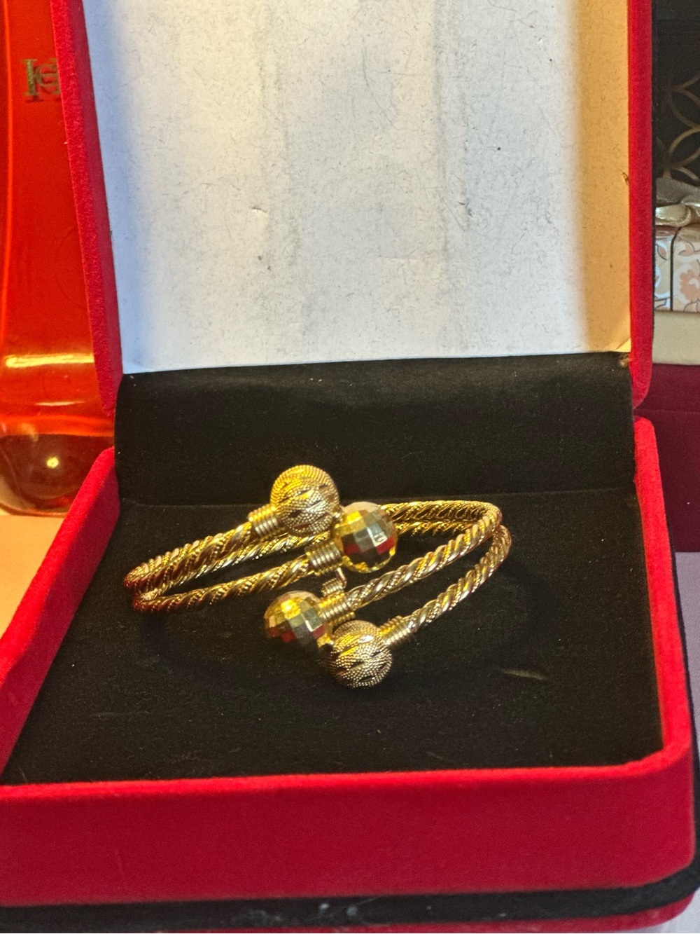 Gorgeous Gold-Plated Twisted Bangle Bracelet with Ball Ends